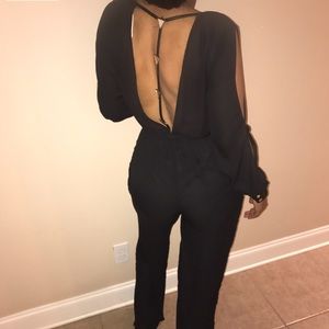 Black long sleeve jumpsuit by mustard seed small